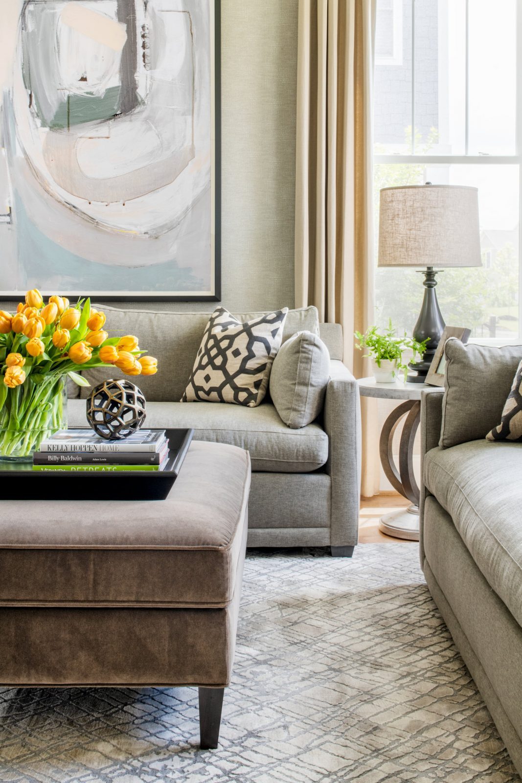 yellow tulips on a coffee table in a living room